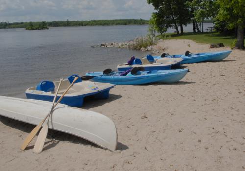 Canoes and paddle boats on the beach